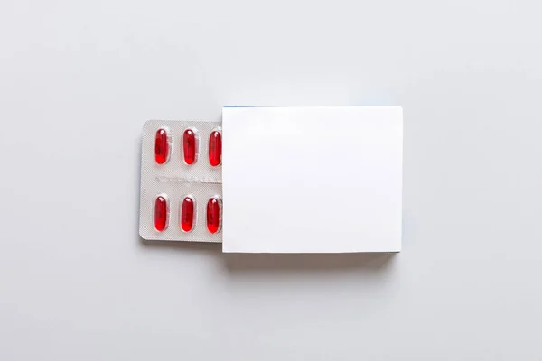 Blank White Product Package Box Mock-up. Open blank medicine drug box with Vatamin a blister top view.