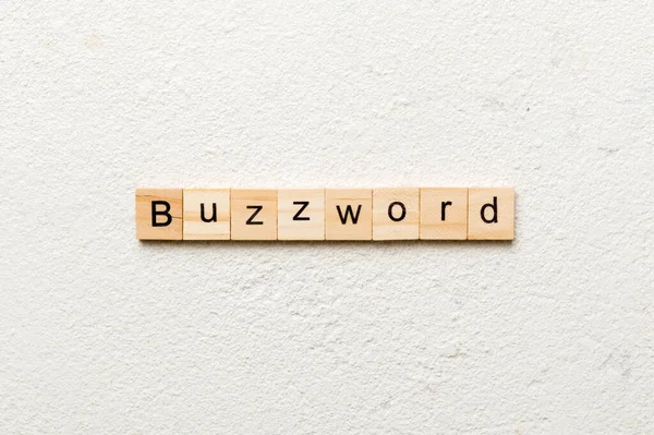 Buzzword Wort Auf Holzblock Geschrieben Buzzword Text Auf Zementtisch Für — Stockfoto