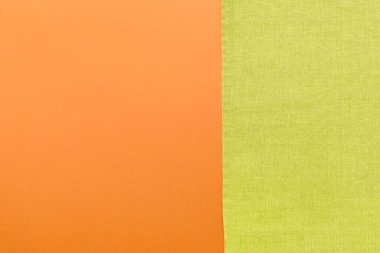 top view with green kitchen napkin isolated on table background. Folded cloth for mockup with copy space, Flat lay. Minimal style.