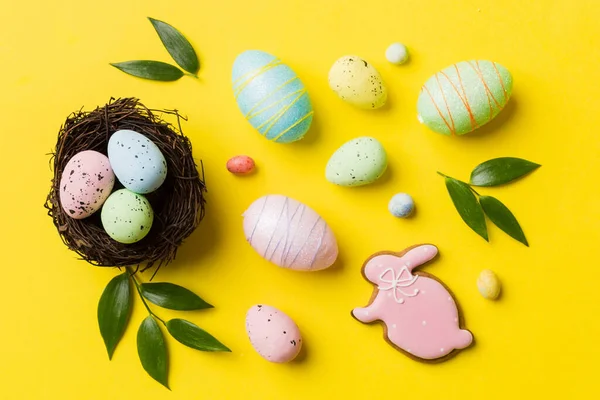 Colorful Easter Eggs Nest Table Background Copy Space Top View — Stockfoto