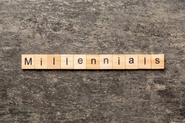 millennials kelime ahşap blok üzerinde yazılı. Millennials metin tablo, kavram.