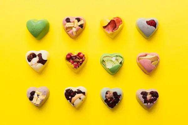 Chocolate Sweets Form Heart Fruits Nuts Colored Background Top View — Foto de Stock