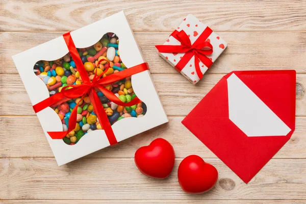 Red Envelope Candy Gift Box Valentines Hearts Colored Background Flat — Stok fotoğraf