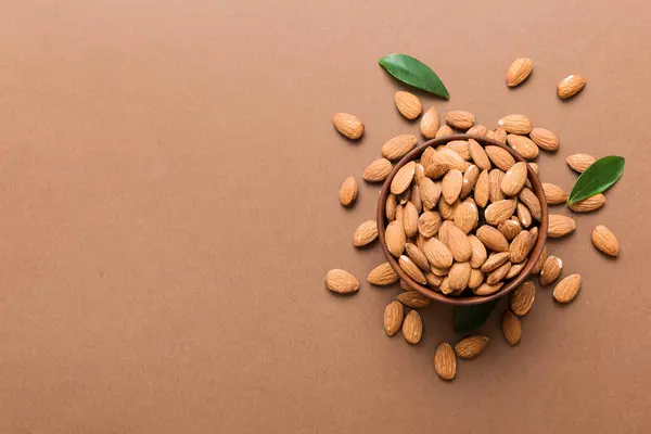 Fresh Healthy Almond Bowl Colored Table Background Top View — Fotografia de Stock