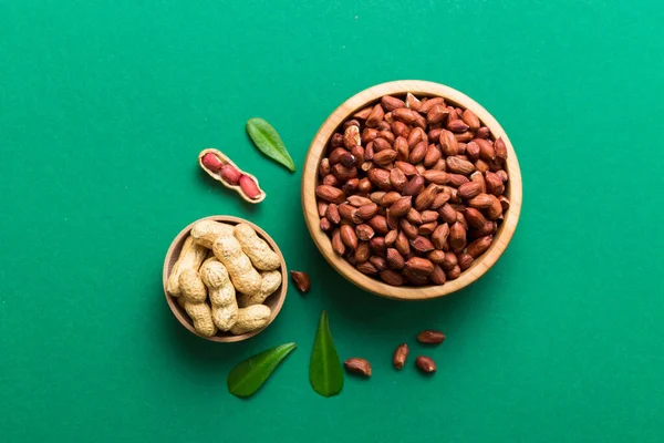 Fresh Healthy Peanuts Bowl Colored Table Background Top View Healthy — Fotografia de Stock