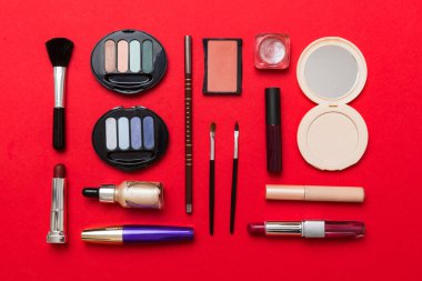Professional makeup tools. Top view. Flat lay. Beauty, decorative cosmetics. Makeup brushes set and color eyeshadow palette on table background. Minimalistic style.