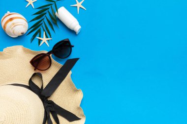 Summer vacation concept flat lay. beach accessories and towel top view. Space for text. travel concept.