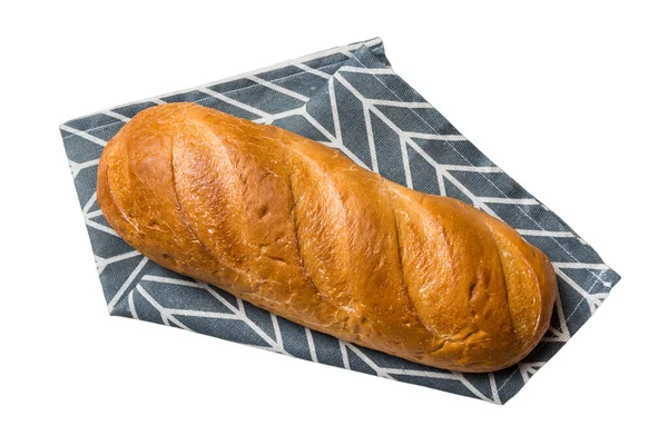 新鲜烘焙的美味的法国面包与餐巾纸隔离在白色背景的顶部视图 健康的白面包面包 — 图库照片