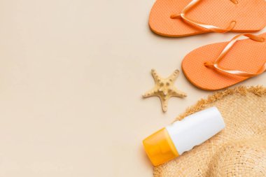 Summer vacation concept flat lay. straw hat beach accessories and towel top view. Space for text. travel concept.