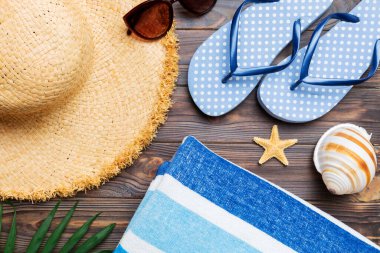 Summer vacation concept flat lay. beach accessories and towel top view. Space for text. travel concept.