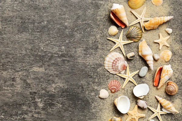 stock image Summer time concept Flat lay composition with beautiful starfish and sea shells on colored table, top view with copy space for text.