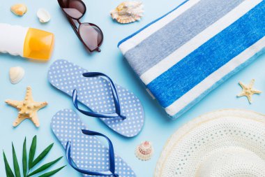 Summer vacation concept flat lay. beach accessories and towel top view. Space for text. travel concept.