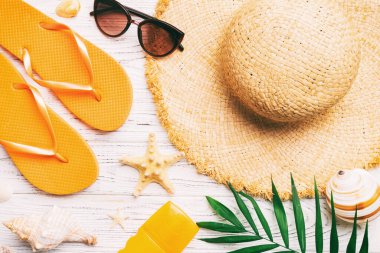 Summer vacation concept flat lay. beach accessories and towel top view. Space for text. travel concept.