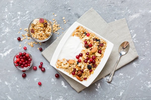 stock image Healthy breakfast food with granola, yogurt, fruits and nuts. Dessert parfait with dried fruits for breakfast.