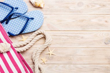 Summer vacation concept flat lay. beach accessories and towel top view. Space for text. travel concept.