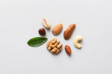 Composition of nuts , flat lay - mix hazelnuts, cashews, almonds on table background. healthy eating concepts and food background.