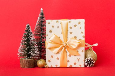 Christmas composition. craft Gift box, small tree, branches and craft DIY decorations on white background. New year concept. Christmas home decoration Flat lay, top view, copy space.