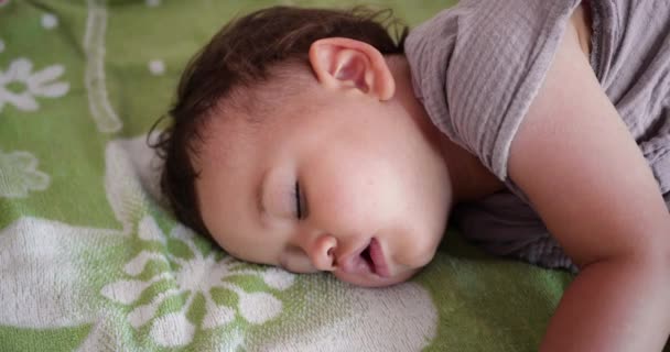 Cute Little Boy Sleeps Sweetly Crib Sees Colorful Dreams Bedroom — Stock Video
