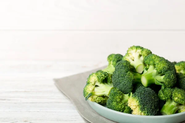 broccoli of fresh green broccoli in bowl over coloredbackground. , close up. Fresh vegetable.
