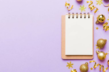 Christmas blank greeting card mock-up scene. Creative layout made of Christmas tree branches and paper card note. Flat lay. Nature New Year concept.