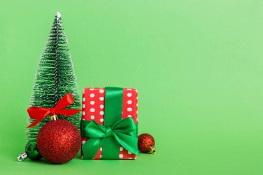 Christmas composition. craft Gift box, small tree, branches and craft DIY decorations on white background. New year concept. Christmas home decoration Flat lay, top view, copy space.