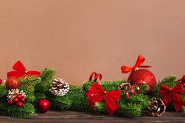 New Year Christmas tree toy, branches of a christmas tree, New Year decorations on a colored background.