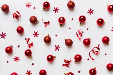 Christmas composition. a pattern of christmas balls on colored background. Flat lay, top view New year decor.