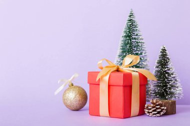 Christmas composition. craft Gift box, small tree, branches and craft DIY decorations on white background. New year concept. Christmas home decoration Flat lay, top view, copy space.