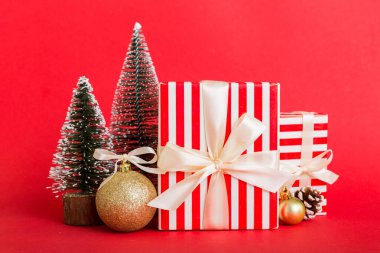 Christmas composition. craft Gift box, small tree, branches and craft DIY decorations on white background. New year concept. Christmas home decoration Flat lay, top view, copy space.