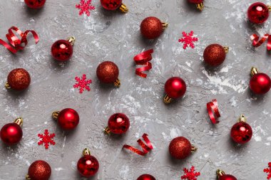 Christmas composition. a pattern of christmas balls on colored background. Flat lay, top view New year decor.