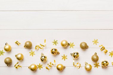 Christmas composition. a pattern of christmas balls on colored background. Flat lay, top view New year decor.