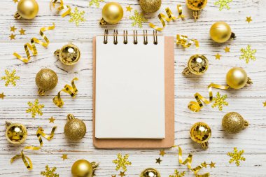 Christmas blank greeting card mock-up scene. Creative layout made of Christmas tree branches and paper card note. Flat lay. Nature New Year concept.