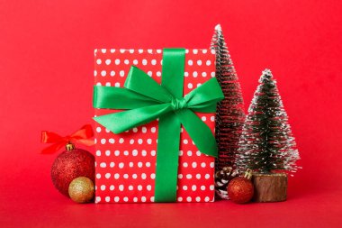 Christmas composition. craft Gift box, small tree, branches and craft DIY decorations on white background. New year concept. Christmas home decoration Flat lay, top view, copy space.