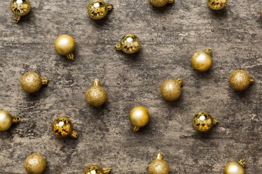 Christmas composition. a pattern of christmas balls on colored background. Flat lay, top view New year decor.