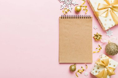 Christmas blank greeting card mock-up scene. Creative layout made of Christmas tree branches and paper card note. Flat lay. Nature New Year concept.