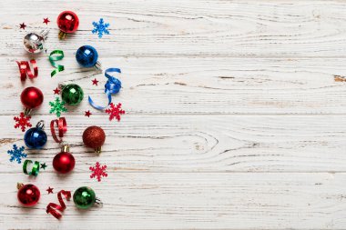 Christmas composition. a pattern of christmas balls on colored background. Flat lay, top view New year decor.