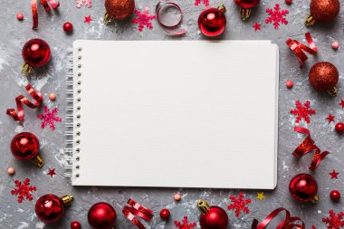 Christmas blank greeting card mock-up scene. Creative layout made of Christmas tree branches and paper card note. Flat lay. Nature New Year concept.