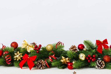 New Year Christmas tree toy, branches of a christmas tree, New Year decorations on a colored background.