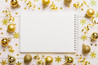 Christmas blank greeting card mock-up scene. Creative layout made of Christmas tree branches and paper card note. Flat lay. Nature New Year concept.