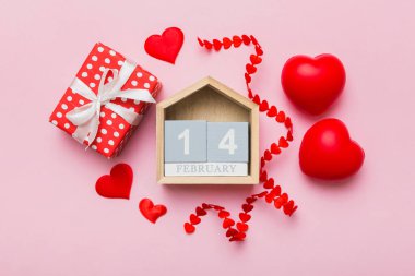 Valentine Day theme with wooden block calendar. Greeting card template for Valentines Day.copy space for text.