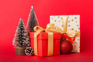 Christmas composition. craft Gift box, small tree, branches and craft DIY decorations on white background. New year concept. Christmas home decoration Flat lay, top view, copy space.