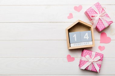 Valentine Day theme with wooden block calendar. Greeting card template for Valentines Day.copy space for text.