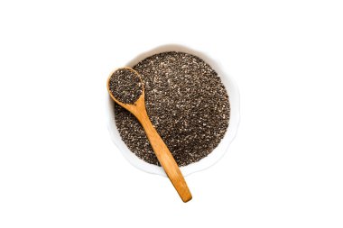 Kavanozda Chia tohumu ve renkli arka planda kaşık. Sağlıklı Salvia Hispanikleri küçük kasede. Sağlıklı süper yiyecekler.