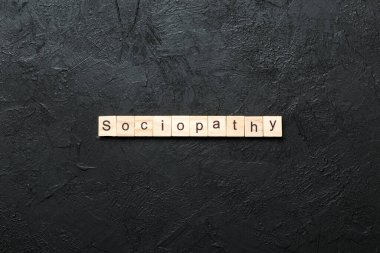 sociopathy word written on wood block. sociopathy text on table, concept. clipart
