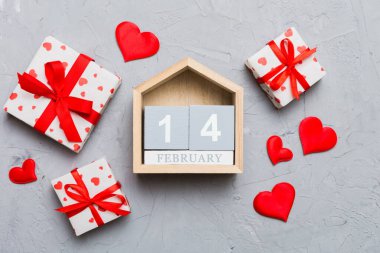 Valentine Day theme with wooden block calendar. Greeting card template for Valentines Day.copy space for text.
