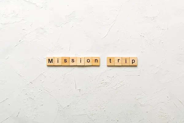 stock image Mission Trip word written on wood block. Mission Trip text on table, concept.