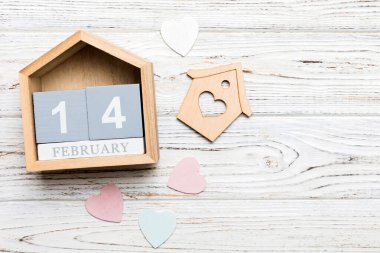 Valentine Day theme with wooden block calendar. Greeting card template for Valentines Day.copy space for text.