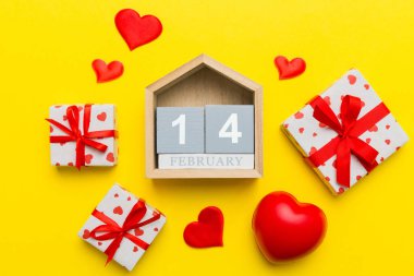 Valentine Day theme with wooden block calendar. Greeting card template for Valentines Day.copy space for text.