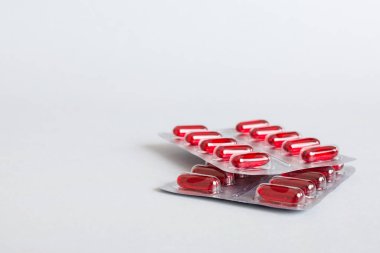 too many different pill cartridges stacked. selective Focus. Packs of blister pills with tablets. Colored pastilles packages. A pile of medicine in blister packs. Pharmaceutical blister packs.