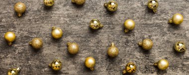 Christmas composition. a pattern of christmas balls on colored background. Flat lay, top view New year decor.